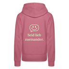 Design Hoodie „Seid lieb zueinander“ für Damen aus Bio-Baumwolle, Farbe: rosa – Dankfabrik.