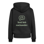Design Hoodie „Seid lieb zueinander“ für Damen aus Bio-Baumwolle, Farbe: schwarz – Dankfabrik.