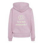 Design Hoodie „Seid lieb zueinander“ für Damen aus Bio-Baumwolle, Farbe: rosa – Dankfabrik.