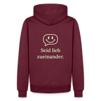 Design Hoodie „Seid lieb zueinander“ für Herren aus Bio-Baumwolle, Farbe: burgunderrot – Dankfabrik.